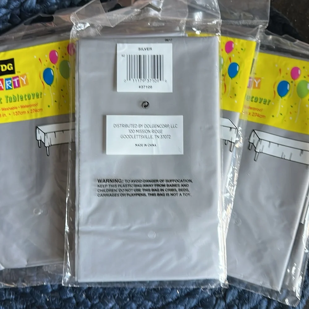 FINAL PRICE:  NEW Party supplies- 5 Silver table cover 54in X 108 in.